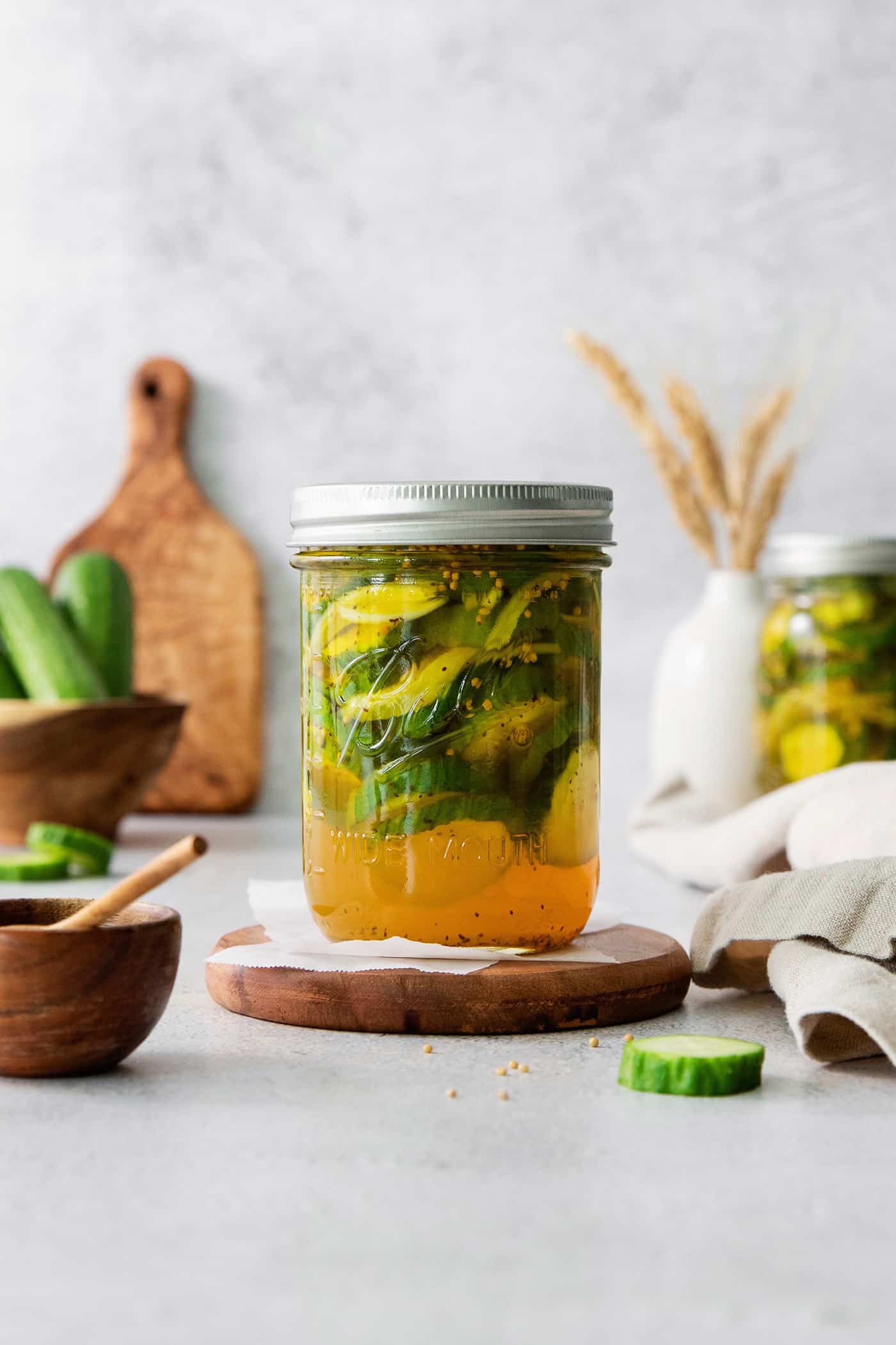 Bread and Butter Pickles are a quick and easy way to make your own pickles. This simple method is packed with flavor and crunch. A jar of bread and butter pickles.