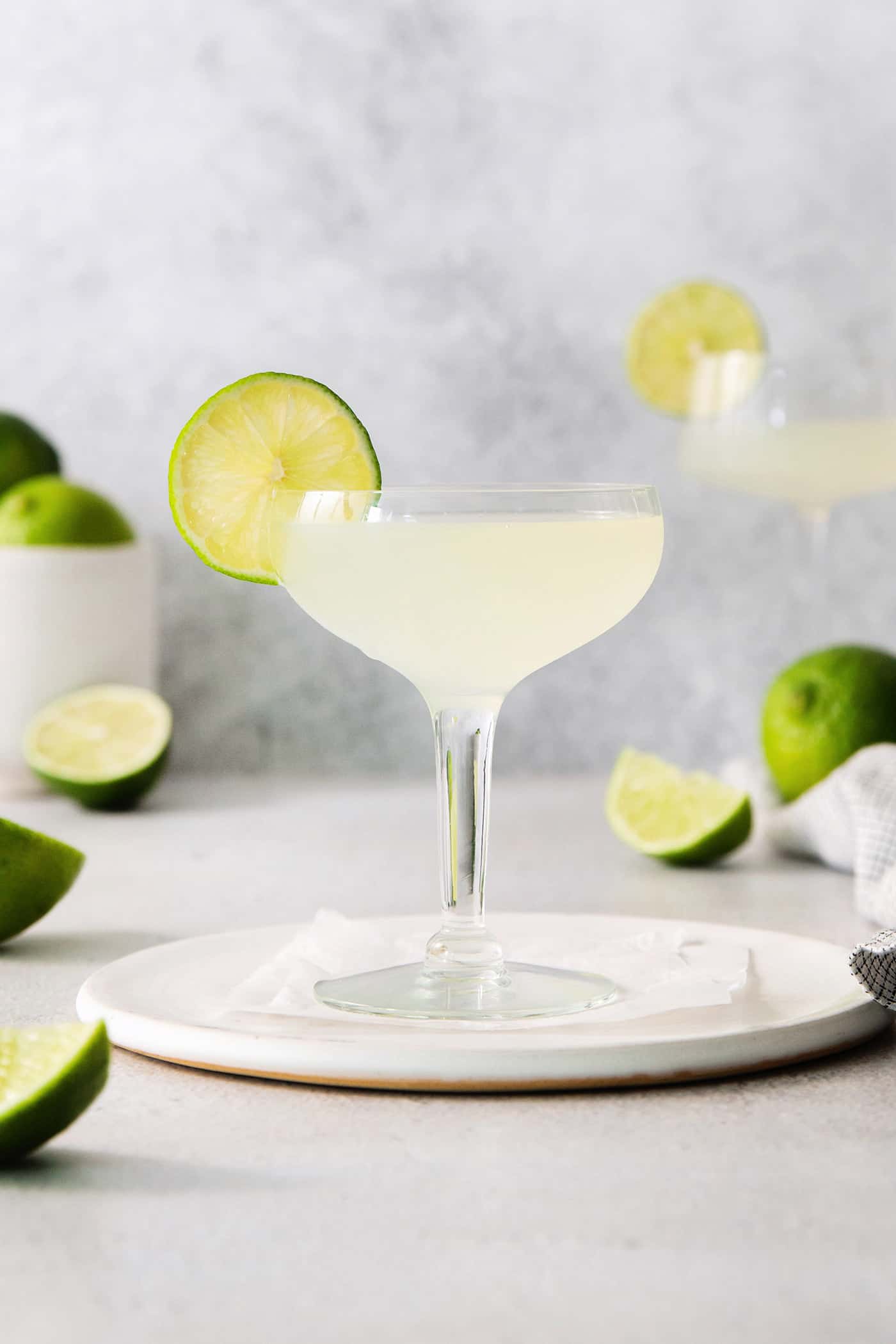 This Classic Daiquiri is an easy and refreshing cocktail you can make with just three ingredients. The perfect balance of sweet and tart! A classic daiquiri cocktail garnished with a lime
