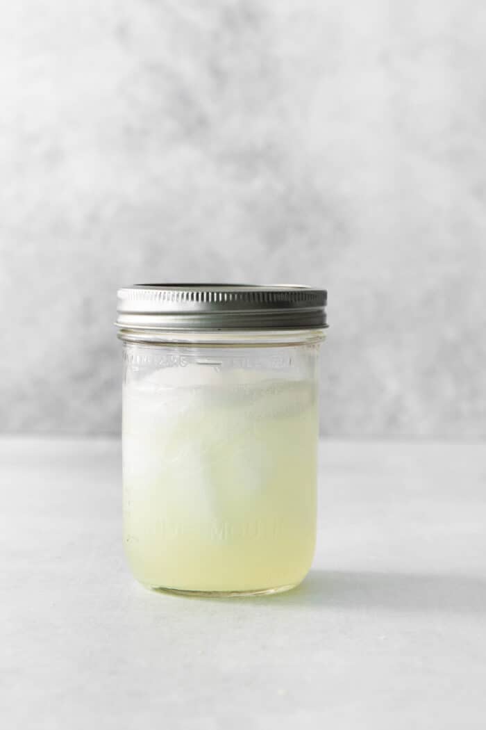 This Classic Daiquiri is an easy and refreshing cocktail you can make with just three ingredients. The perfect balance of sweet and tart! Daiquiri ingredients in a mason jar