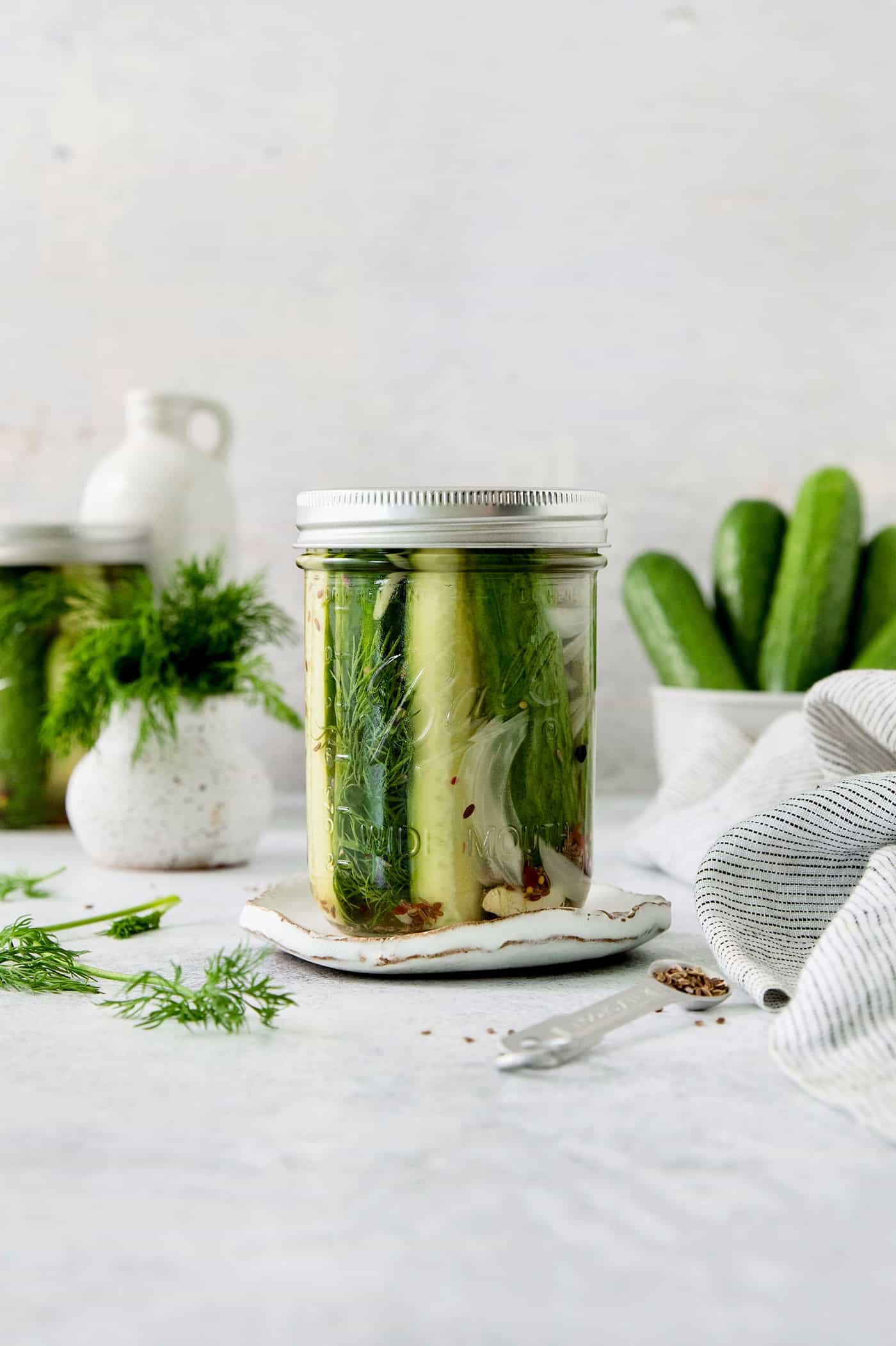 These Refrigerator Dill Pickles require no canning or special equipment, just cucumbers and a simple pickling brine. An easy side or snack! A jar of refrigerator dill pickles
