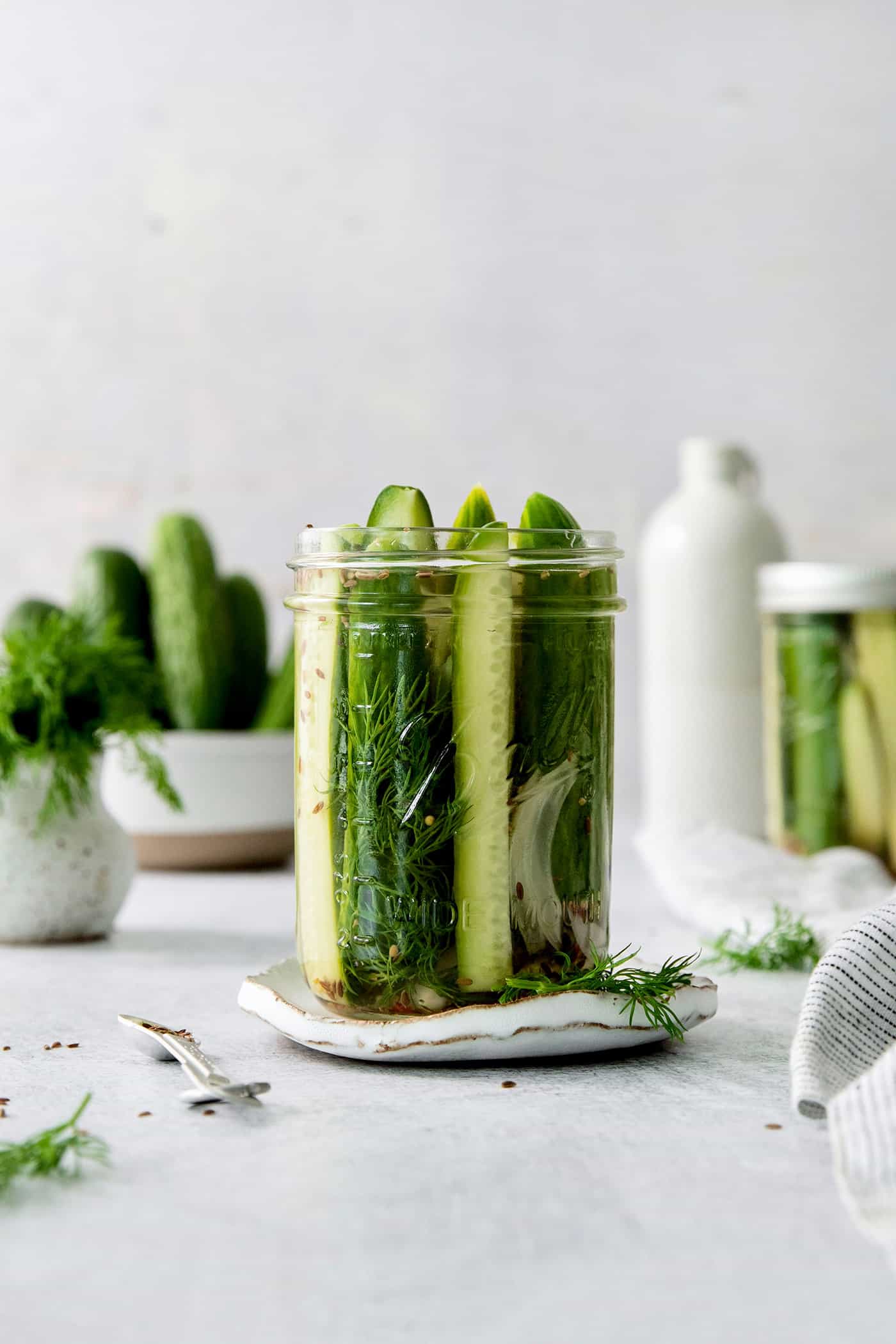 These Refrigerator Dill Pickles require no canning or special equipment, just cucumbers and a simple pickling brine. An easy side or snack! A jar of quick dill pickles