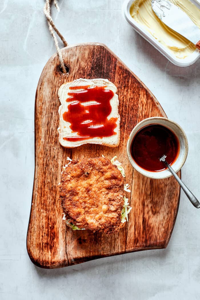 Pork, bread, and tonkatsu sauce.