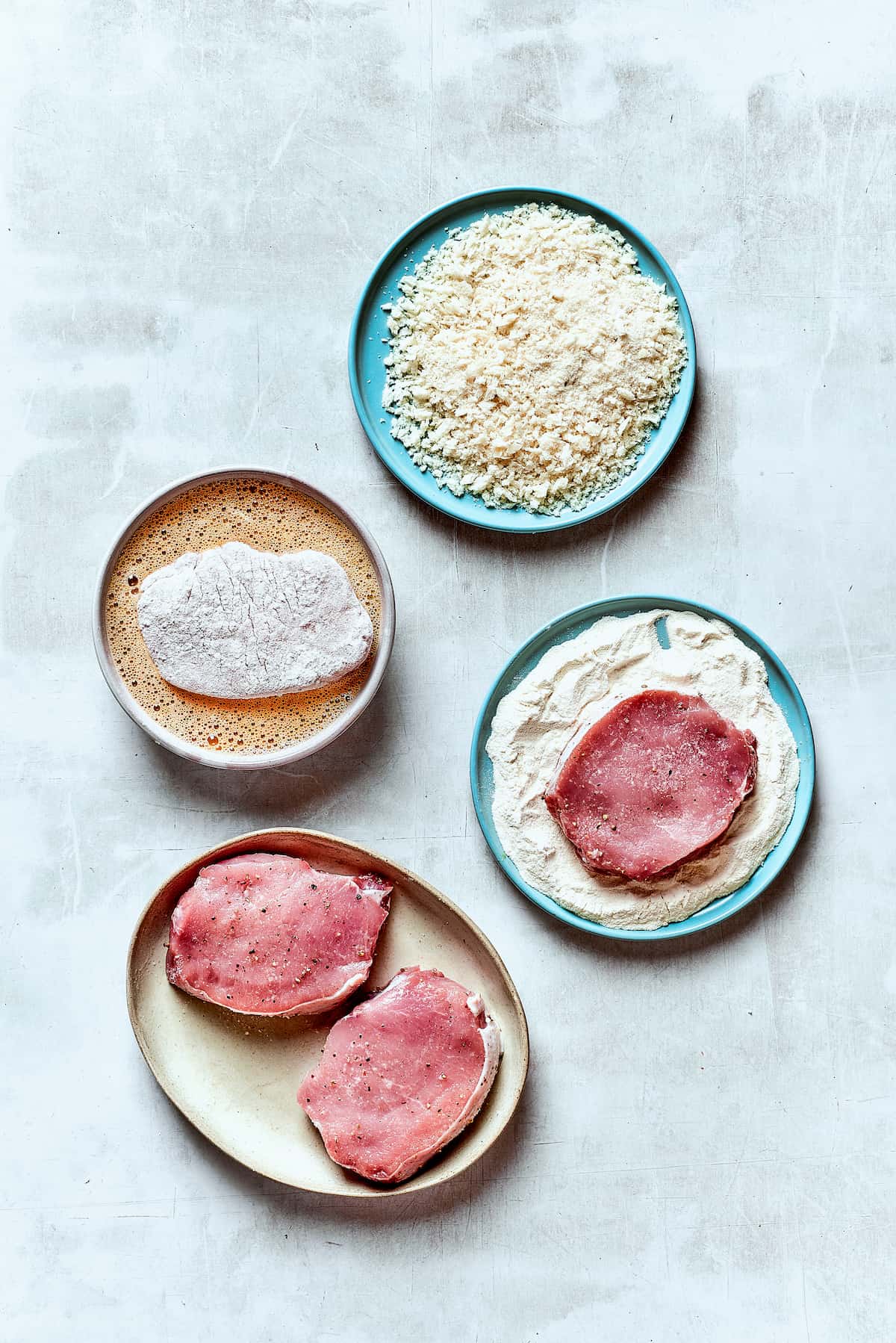 Tender, juicy Pork Katsu is always welcome on my dinner table! This Japanese dish deep fries breaded pork loin until crispy. Ingredients for pork katsu - eggs, pork, breadcrumbs, flour.