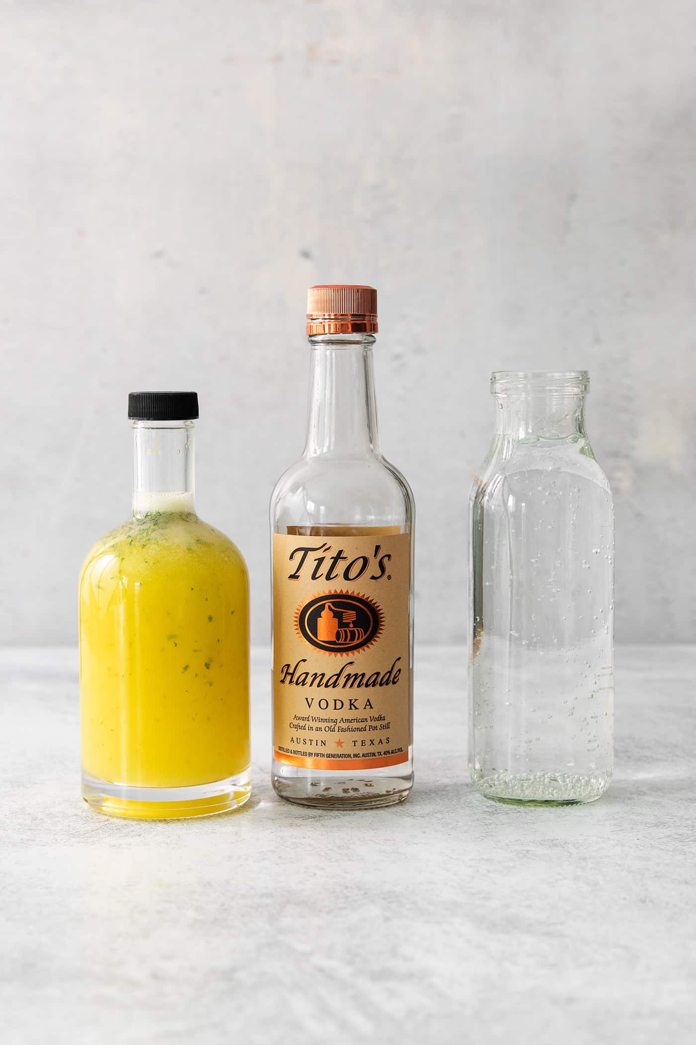 Try a Bootleg Cocktail for a citrus-infused treat of a cocktail! Lemon, lime, and orange juice combine with vodka and mint. Ingredients needed to make bootleg cocktail: bootleg mix, vodka, club soda.