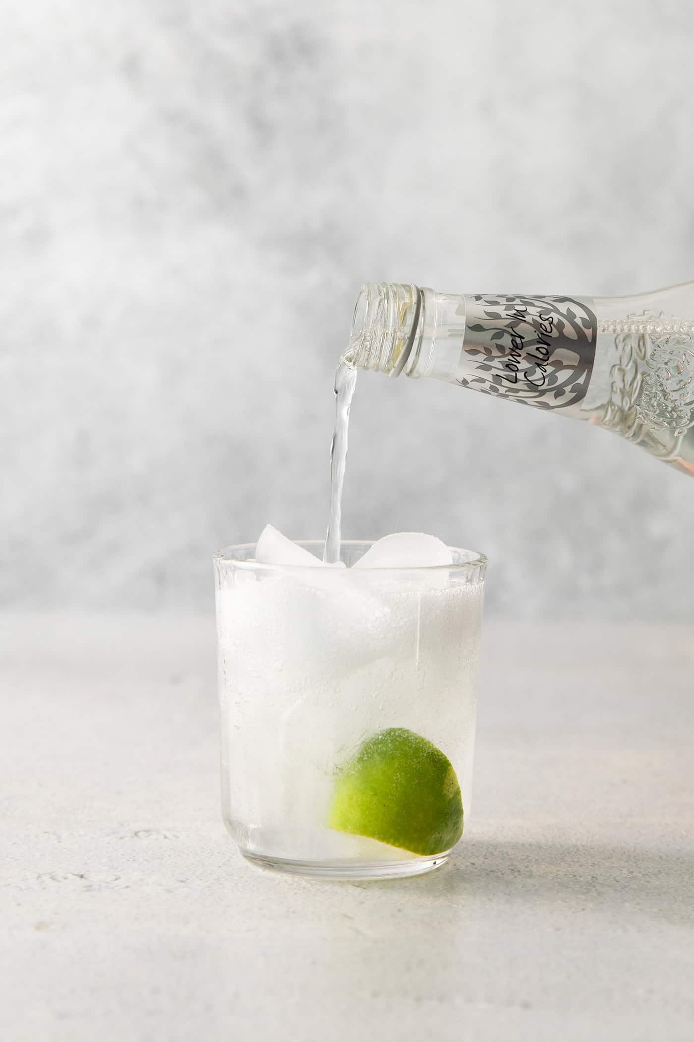 A Classic Gin and Tonic is a must to master. This recipe is for a super simple, super refreshing, and always-in-style cocktail. Tonic is poured into a glass of ice, gin, and lime