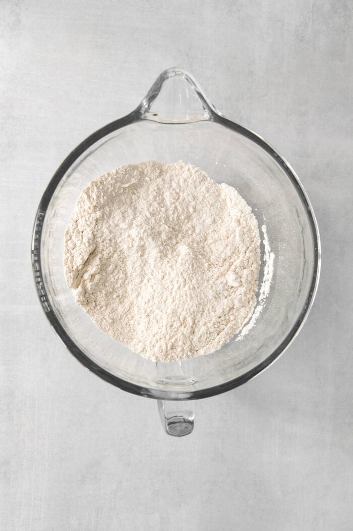 These copycat Rhodes Rolls are light and fluffy with a tender crumb and delicate flavor. Perfect for holiday meals! A top down shot of mixing dry ingredients.