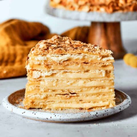 a piece of Napoleon cake on a plate