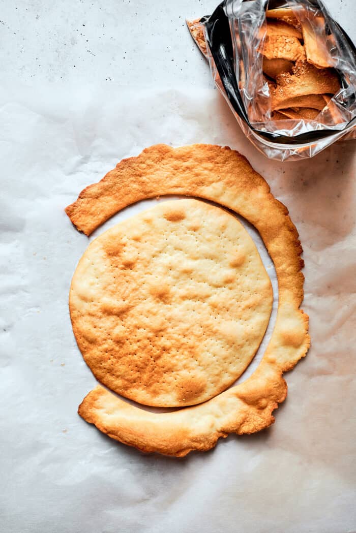 Napoleon Cake takes flaky homemade pastry and layers it with a sumptuous egg custard to make a creamy and cool dessert! a single baked layer of pastry for napoleon cake