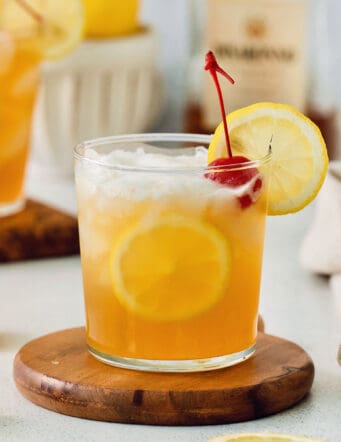 a glass of amaretto sour cocktail