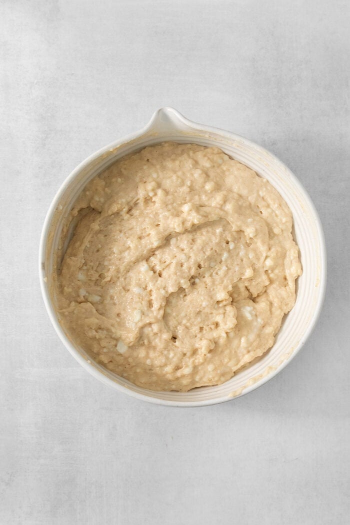 rotein-packed Cottage Cheese Pancakes are light and fluffy, flavored with cinnamon and vanilla, and rich and creamy from cottage cheese. Cottage cheese pancake batter is slightly lumpy in a white bowl.