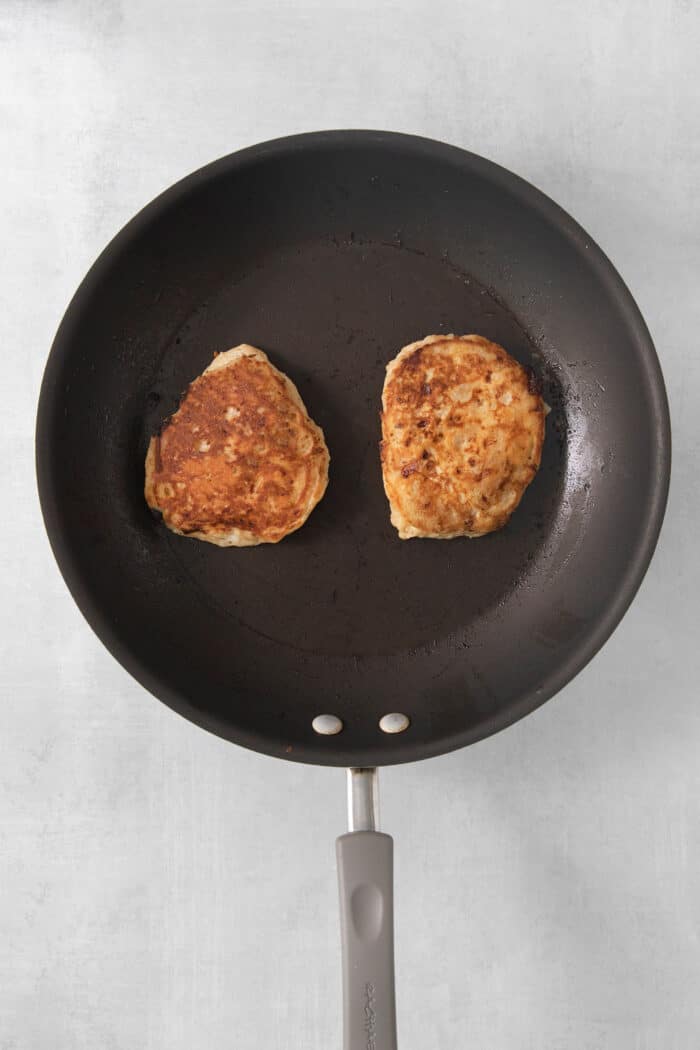 rotein-packed Cottage Cheese Pancakes are light and fluffy, flavored with cinnamon and vanilla, and rich and creamy from cottage cheese. Two cottage cheese pancakes cook in a skillet.