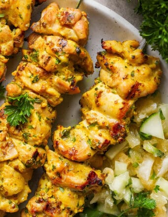 A plate of Chicken Kabobs with Meyer Lemon Salsa.
