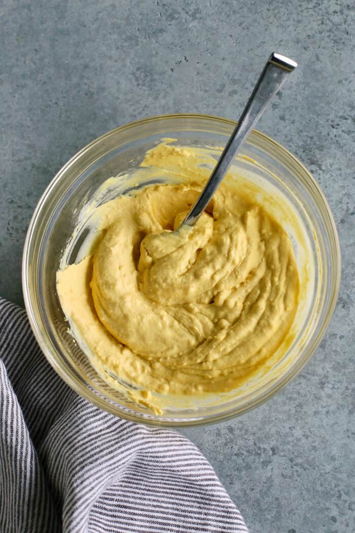 This Classic Deviled Eggs recipe is a beloved appetizer that features an irresistibly creamy and tangy filling made with simple basics. Make this easy deviled eggs recipe as written or try some of my flavorful variation suggestions. The deviled egg filling is combined in a bowl.