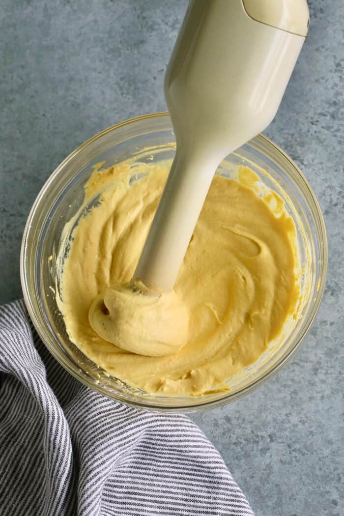 This Classic Deviled Eggs recipe is a beloved appetizer that features an irresistibly creamy and tangy filling made with simple basics. Make this easy deviled eggs recipe as written or try some of my flavorful variation suggestions. Using an immersion blender to make the filling smooth.