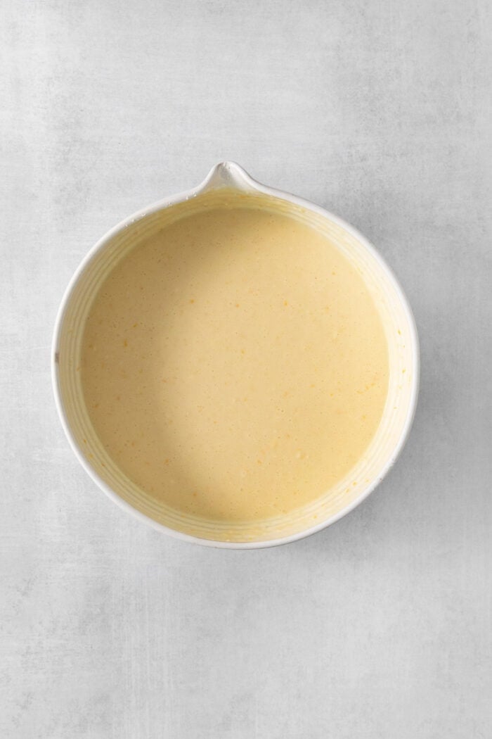 The bowl of crepe batter rests.