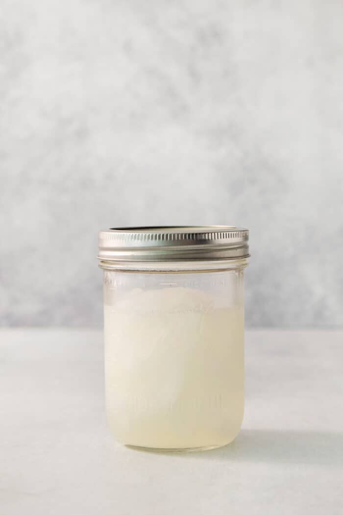 This Classic Margarita recipe makes the perfect tequila cocktail! Learn how to make a margarita that's always crisp, cold, and refreshing. The mixed margarita in a jar.
