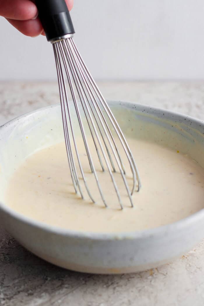 This gorgeously rich and creamy homemade Caesar Dressing recipe is perfect for making a classic Caesar salad. Takes minutes to make. A whisk is used to blend the dressing.