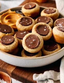 Flaky salt is seen sprinkled over the top of the peanut butter cookies.
