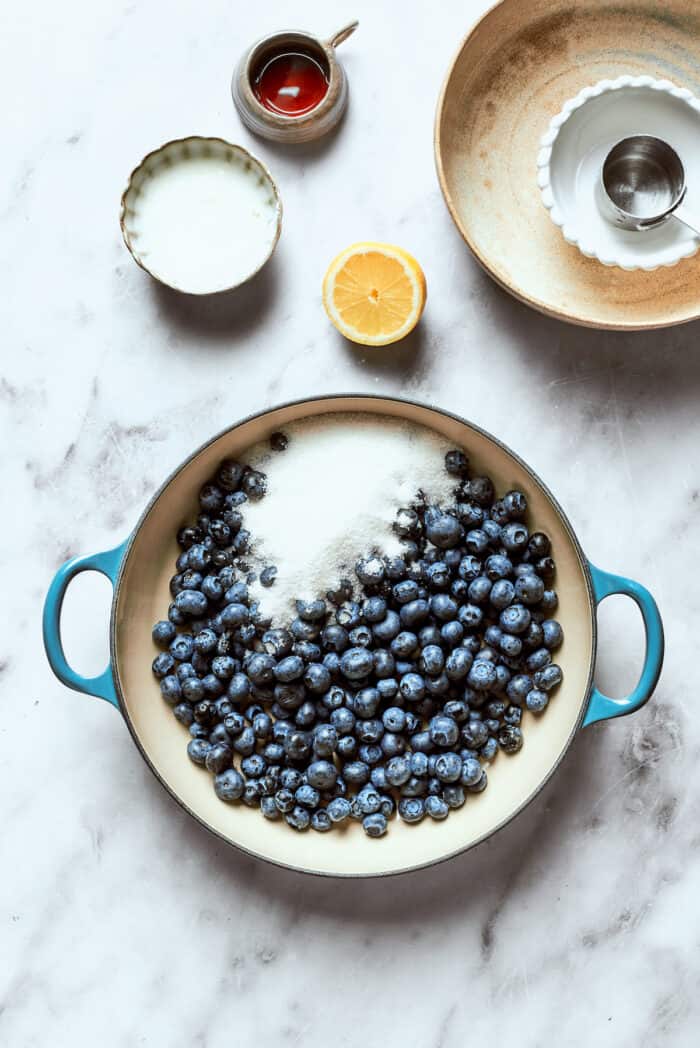 Vanilla is added to the blueberries.