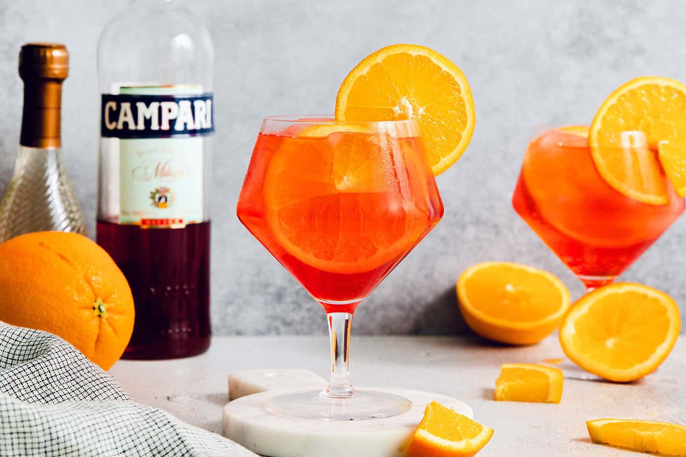 Campari spritz cocktails in stemmed glasses