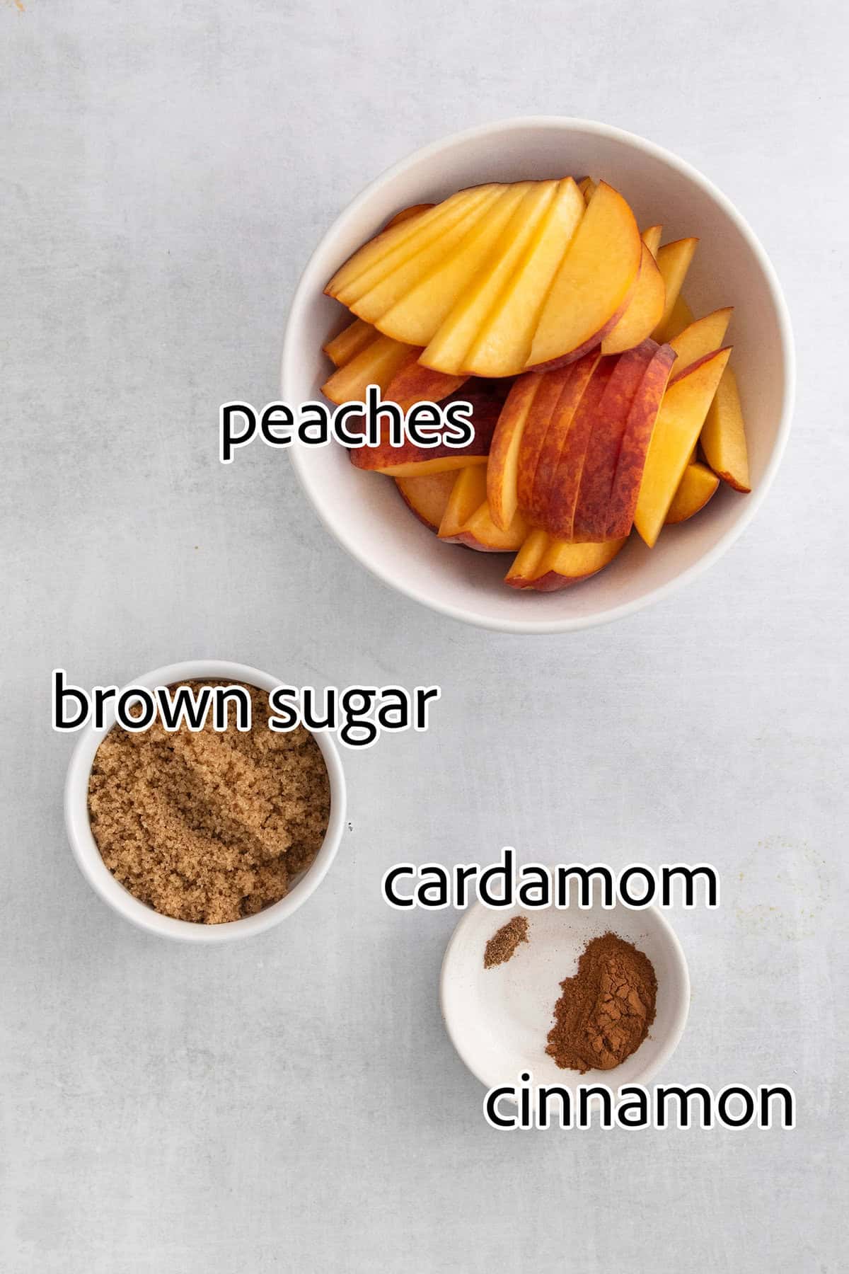 These Peach Bars feature a tender, buttery base topped with ripe, juicy peaches swirled with a touch of cinnamon. Peach bar filling ingredients are shown labeled: brown sugar, peaches, cardamom and cinnamon.