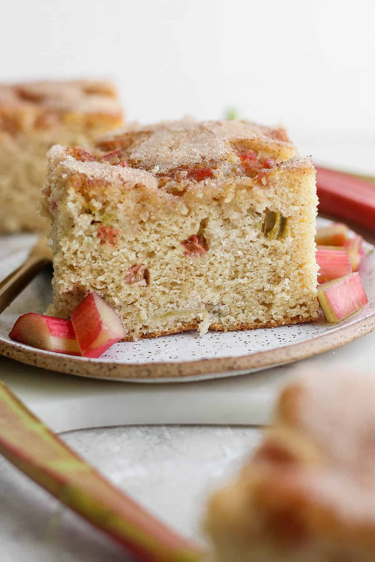 a piece of rhubarb coffee cake on a plate
