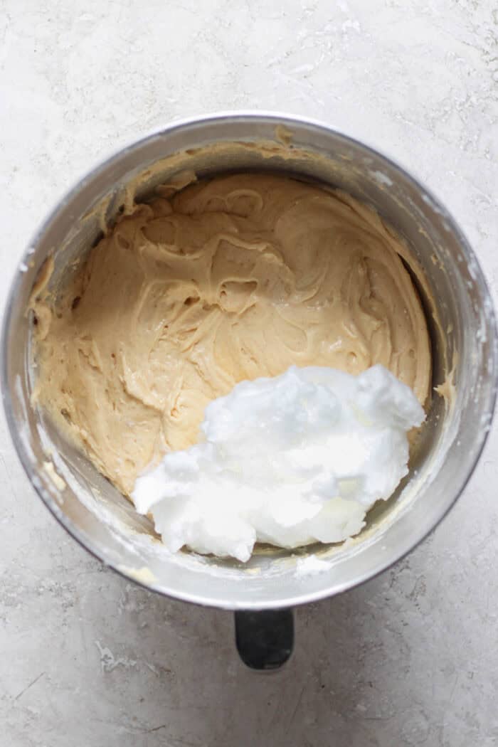 adding beaten egg whites to the rhubarb coffee cake batter