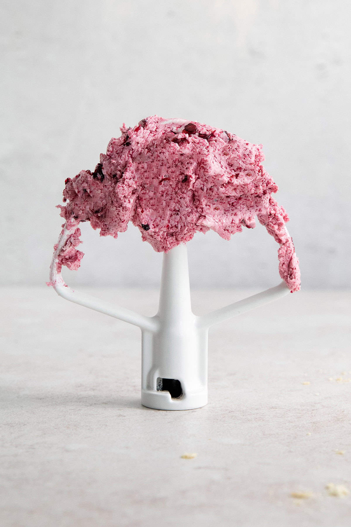 This Blueberry Butter is lightly sweet and luxuriously fluffy, with an easy homemade fresh blueberry sauce as its base. Blueberry butter on the attachment of a stand mixer.