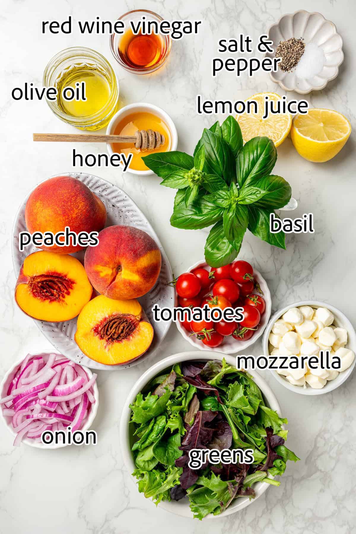 Sweet and juicy Grilled Peach Salad features lightly grilled peaches served with greens, cherry tomatoes, and fresh mozzarella. ingredients to make a salad with grilled peaches