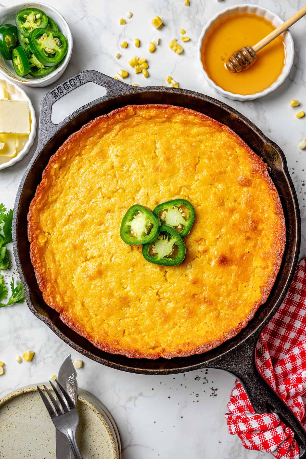 overhead photo of Jiffy corn casserole in a cast iron pan
