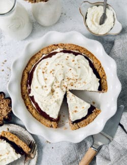 Overhead shot of homemade possum pie with fluffy whipped cream on top.