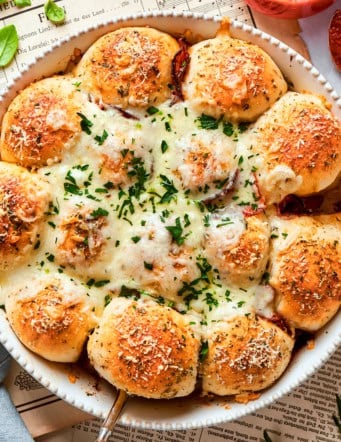 pizza bites in a white baking dish