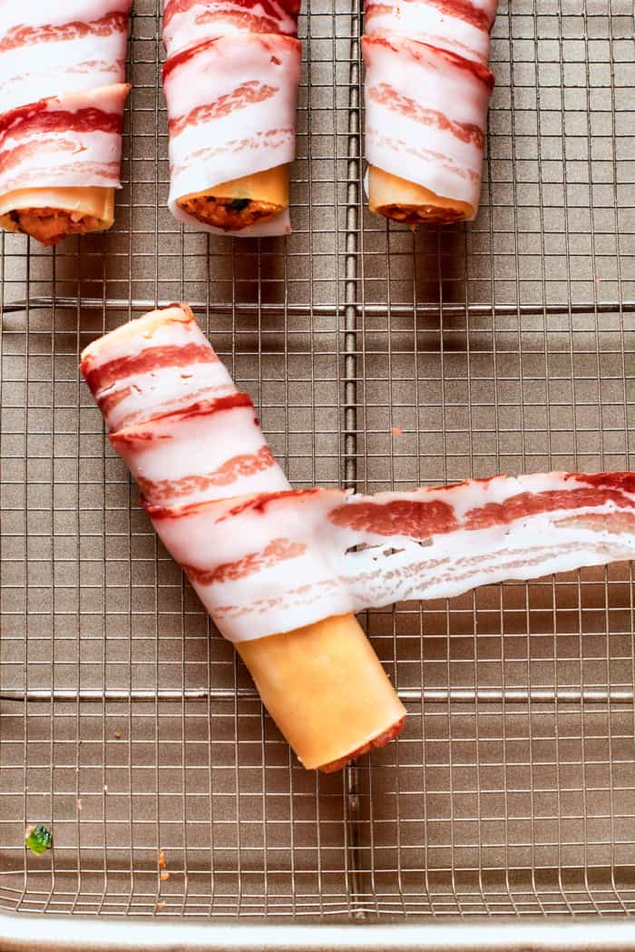 This baked shotgun shells recipe is a simpler version you can make in the oven — no smoker required! Smoky, savory, spicy and irresistible! Wrapping bacon around pasta shells