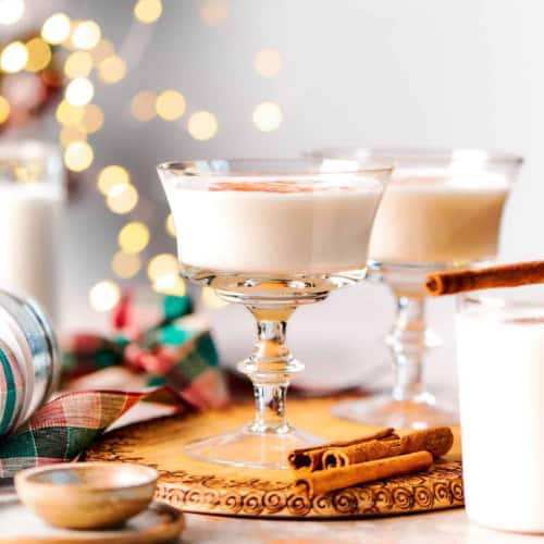 two glasses of vanilla almond steamer and twinkly lights