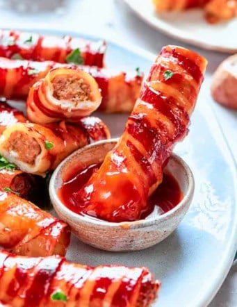 shotgun shells appetizer on a plate with BBQ sauce