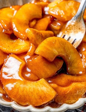 close-up photo of sauteed apples in a white dish