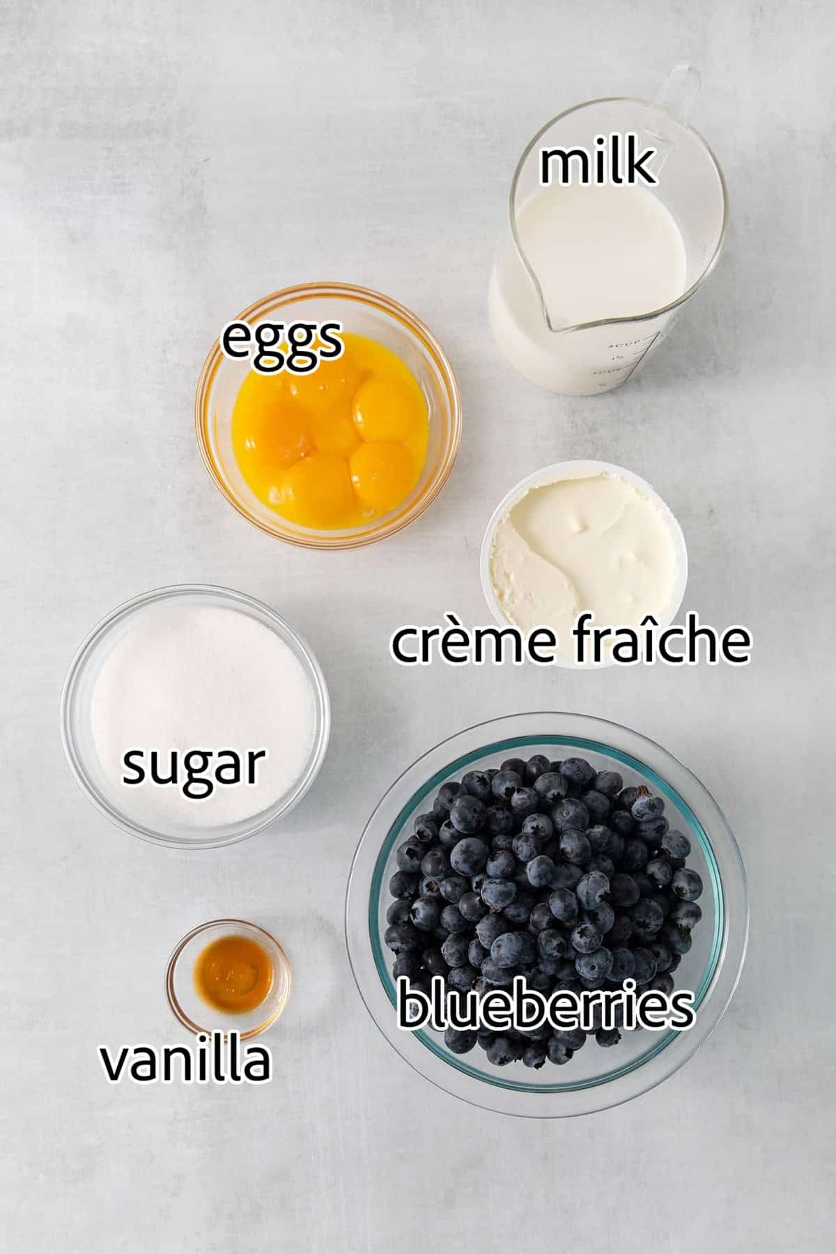Summer-sweet Crème Fraîche Blueberry Ice Cream swirls roasted blueberries into a creamy ice cream to make the best of blueberry season! ingredients needed for blueberry ice cream