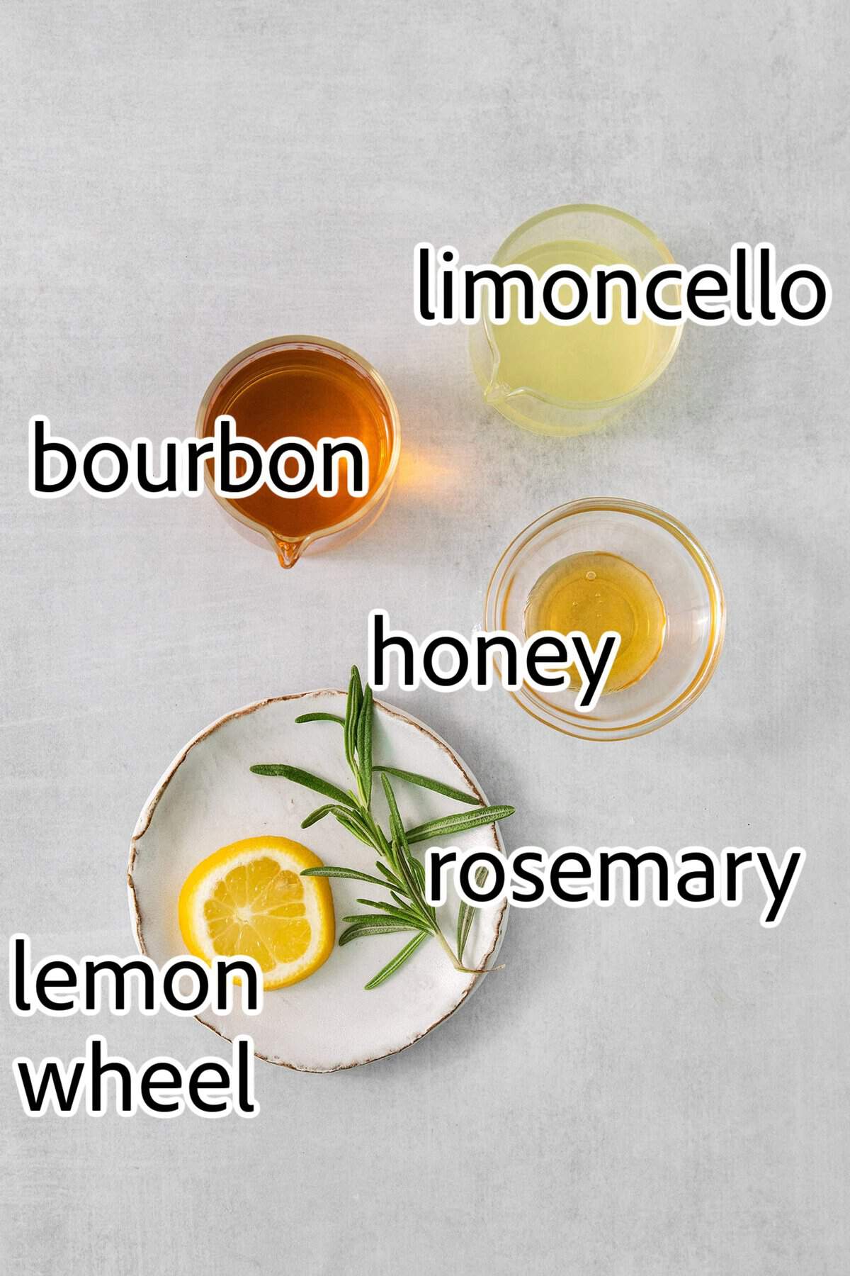 This Bourbon Limoncello Cocktail is a refreshing drink featuring fresh rosemary, lemon, honey, bourbon, and limoncello. ingredients needed for bourbon limoncello cocktails