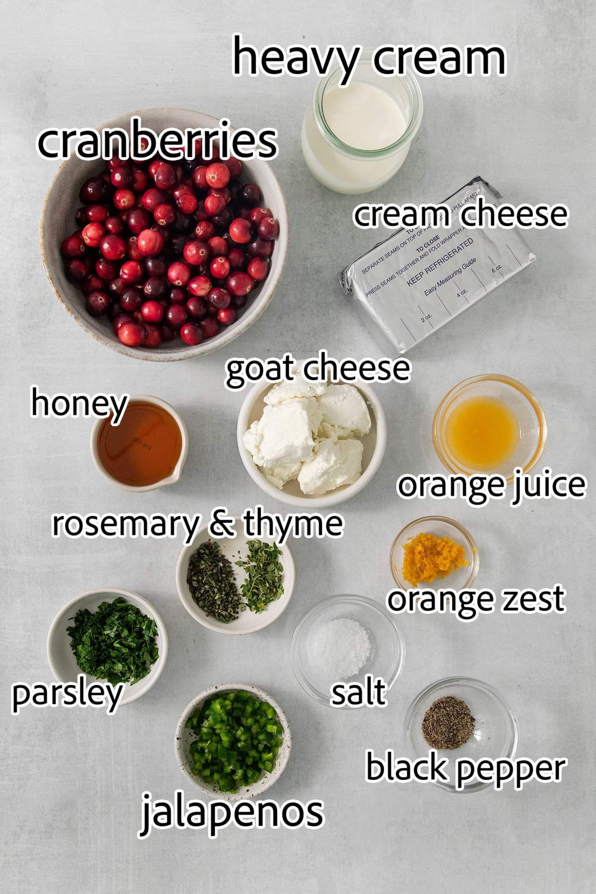 This Cranberry Jalapeno Dip is a quick and easy holiday appetizer! It features cream cheese and goat cheese and a cranberry-jalapeno relish. ingredients needed for cranberry jalapeno dip
