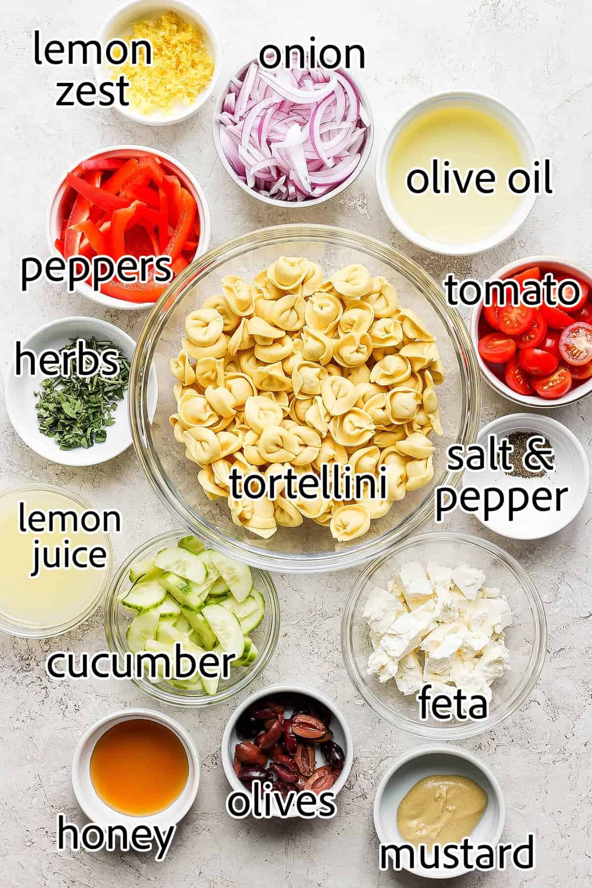 reek Tortellini Salad is full of fresh Greek flavors like lemon, olive oil, herbs, and feta cheese! This cold salad is great at picnics. ingredients needed for greek tortellini salad