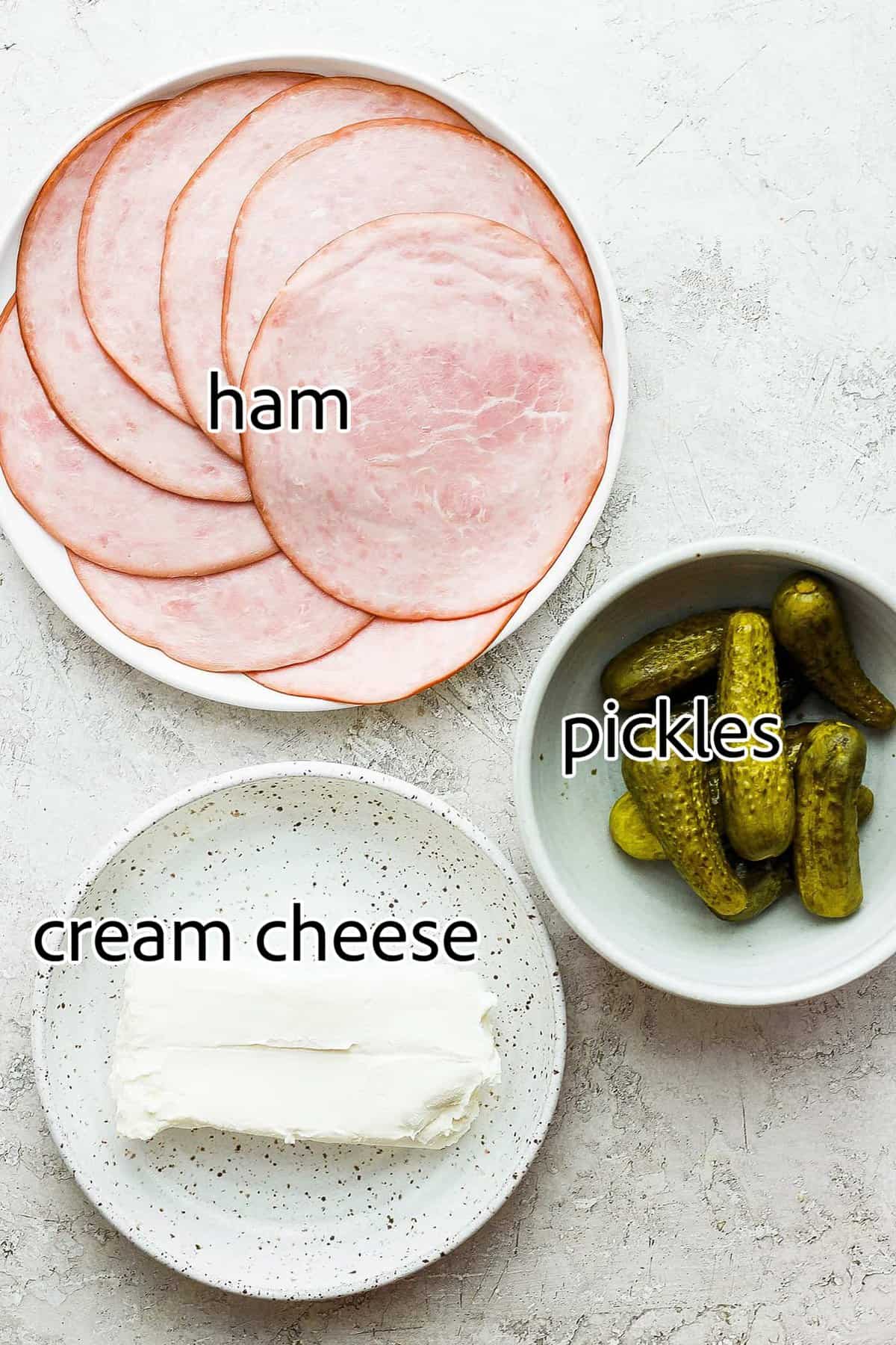 ickle Roll Ups are a 3-ingredient appetizer that's perfect for a party snack or anytime! Tangy pickles are filled with cream cheese and ham. ingredients needed for pickle roll ups