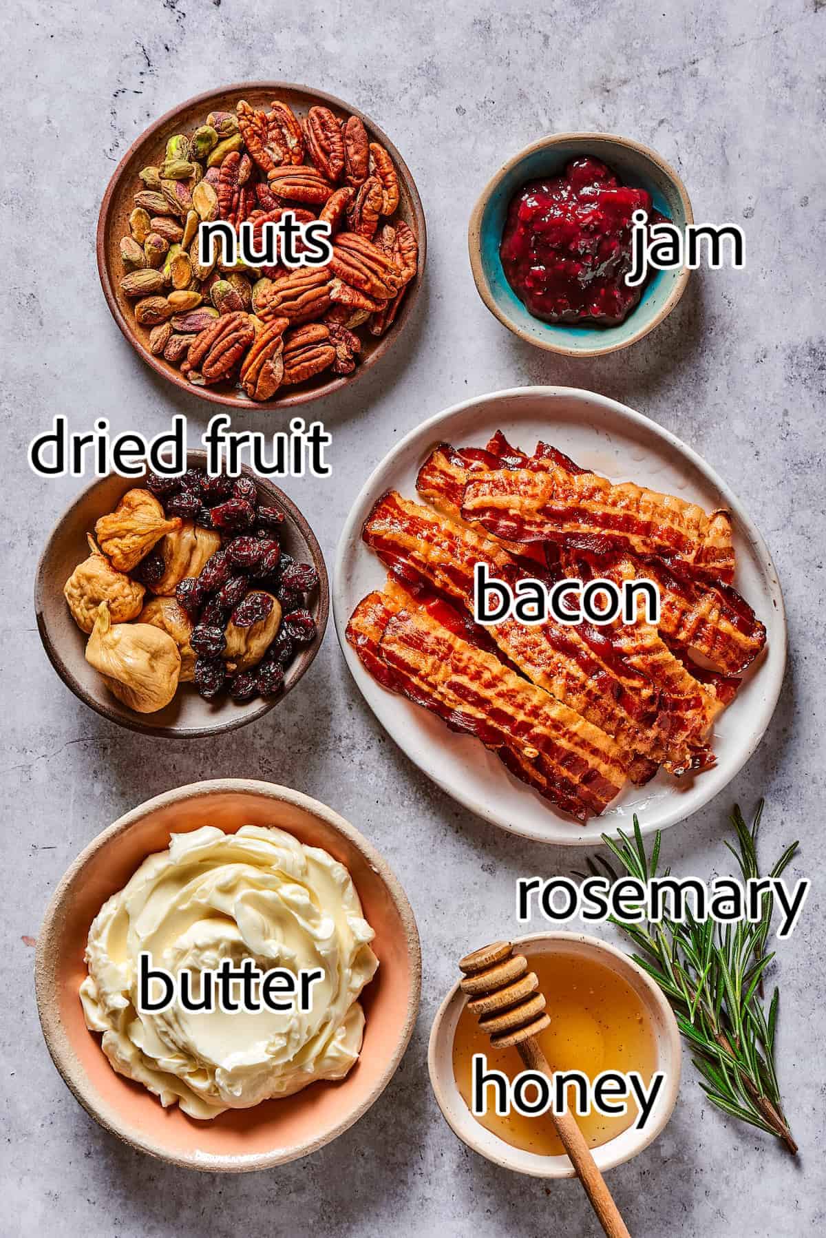 This Butter Board with Bacon Butter features toppings like dried fruits, nuts, and honey for an easy, savory butter charcuterie board. ingredients needed for a butter board with bacon and dried fruits