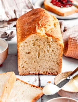 a loaf of homemade English muffin bread with one end sliced off