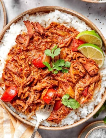 a bowl of rice with shredded beef curry