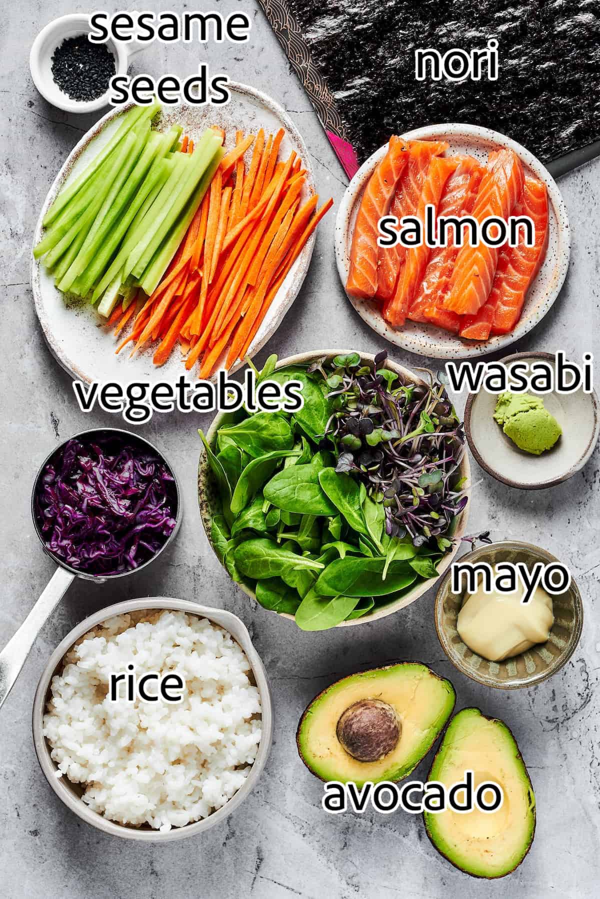 This Sushi Burrito recipe results in a giant sushi roll stuffed with spicy salmon, rice, avocado, carrots, and other veggies. ingredients needed for sushi burritos