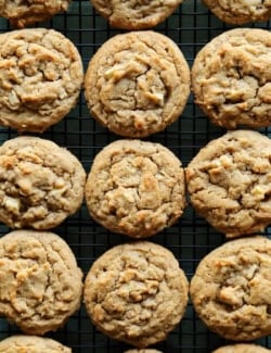 overhead photo of peanut butter apple cookies on a cooling rack