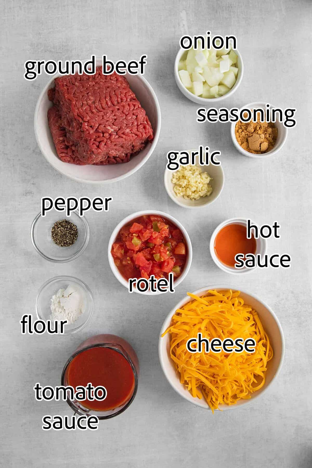 This Cheesy Beef Taco Dip is full of the beefy taco flavor you love, with ground beef, taco seasoning, Rotel, and loads of cheddar cheese. ingredients needed for cheesy beef taco dip