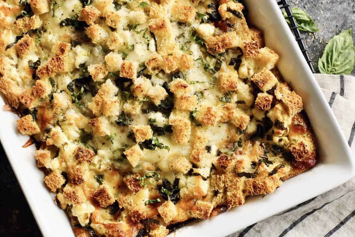 overhead photo of overnight egg bake in a white baking dish