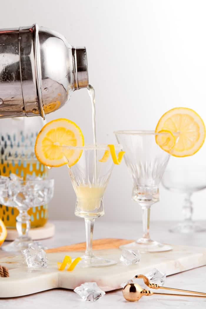 This limoncello martini is the brightest, sunniest cocktail you’ll ever sip! It’s tart yet smooth, with just the right balance of sweetness. Pouring limoncello martini into glass