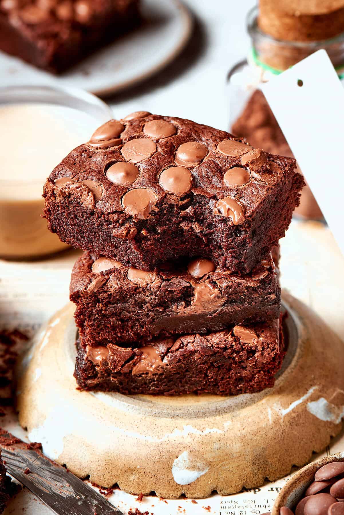 These fudgy brownies are a cinch to make with everyday pantry ingredients and the intensely fudgy texture and chocolate flavor is awesome! a stack of fudgy brownies